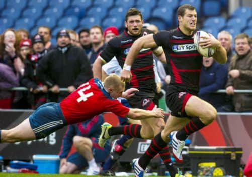 Tim Visser, right, breaks away from Keith Earls to score his side's second try of the game. Picture: SNS