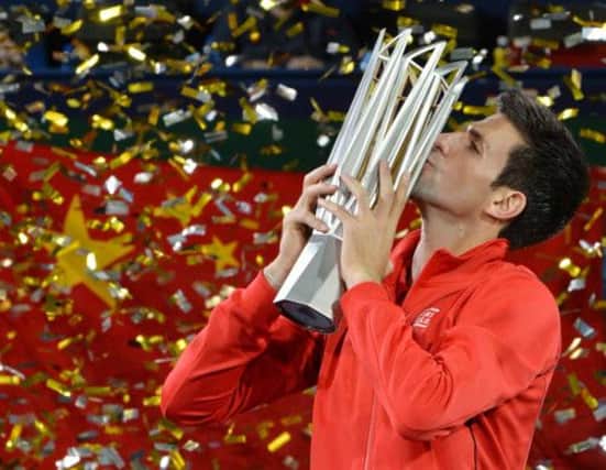 Novak Djokovic celebrates after winning the Shanghai Masters, having been pushed all the way by Juan Martin Del Potro. Picture: Getty