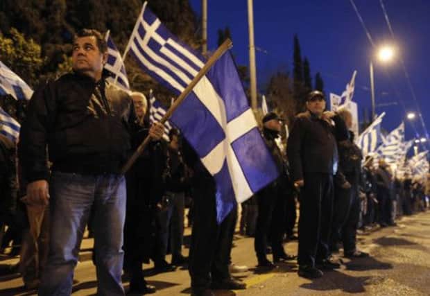 Golden Dawn activists protest at the German embassy in Athens. Picture: Reuters