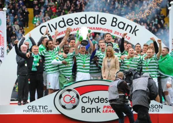 Celtic celebrate their league title win last season. Picture: Robert Perry