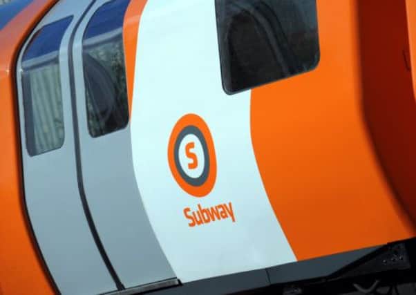 The Glasgow Subway is known for its distinctive orange livery. Picture: Contributed