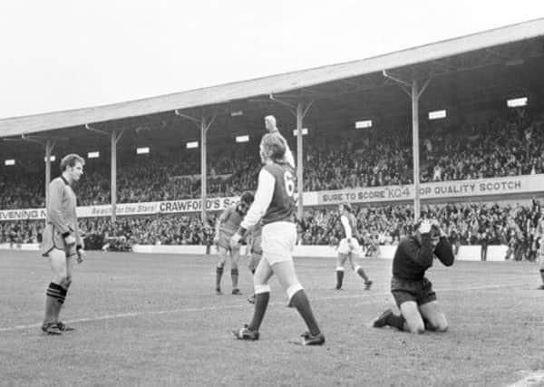 Dundee United keeper Hamish McAlpine holds his head in his hands after conceding in a 1972 game against Hibs. Picture: TSPL