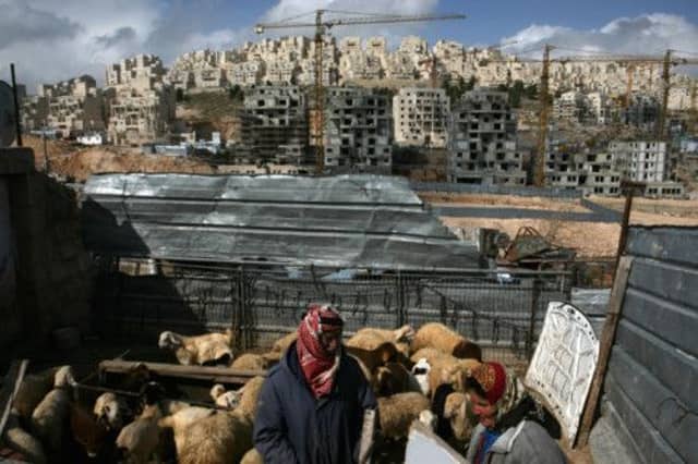 Palestinian Said Eid and his wife Fatima on their land near Har Homa. Picture: AFP/Getty