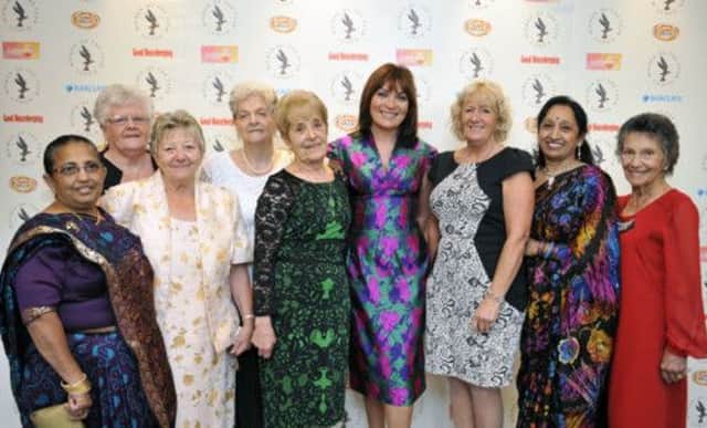 Lorraine Kelly with members of the former machinists plant at Ford Motor Company in Dagenham. Picture: PA