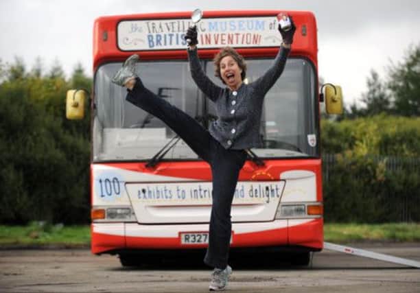 Travelling Museum curator Colette Hiller in front of the bus donated by First Scotland that will serve as the mobile exhibition space that will tour Scotland. Picture: Jane Barlow
