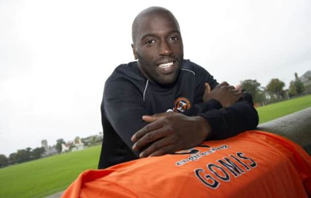 Morgaro Gomis is pleased to be playing football once again after rejoining Dundee United. Picture: SNS