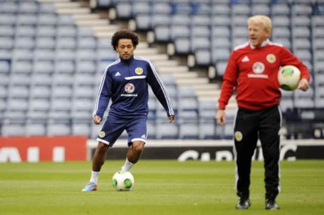 Ikechi Anya and Gordon Strachan train at Hampden ahead of their game with Croatia. Picture: Greg Macvean