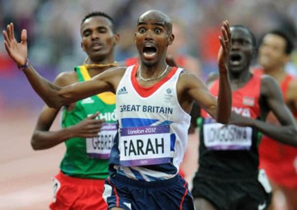 Mo Farah celebrates winning Olympic gold - but the double Olympic champion may miss Glasgow 2014. Picture: Ian Rutherford