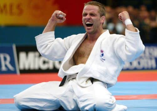 Graeme Randall shows his elation at winning gold in Manchester. Picture: PA