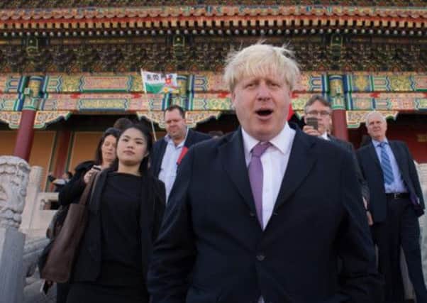 Boris Johnson at Beijing's Forbidden City. Johnson believes UK children should learn Mandarin Chinese as standard. Picture: PA