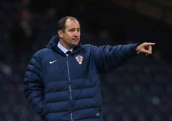 Igor Stimac instructs his team during their 2-0 defeat to Scotland. Picture: Getty