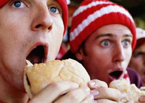 Experts at Glasgow University will lead the drive to improve the health of football fans. Picture: Getty