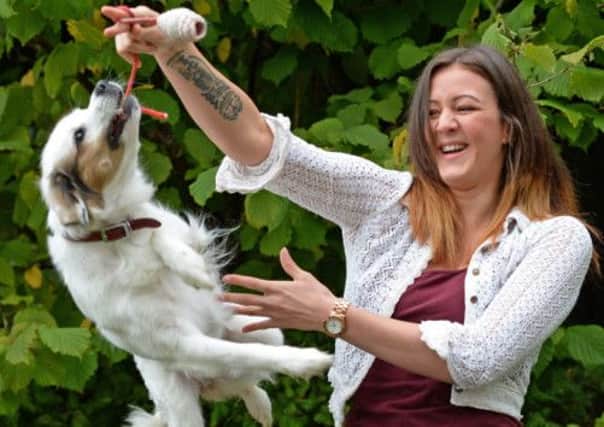 Seven-year-old Collie cross Jess with owner Emily Worgan. Picture: Mike Day/Central Scotland News Agency