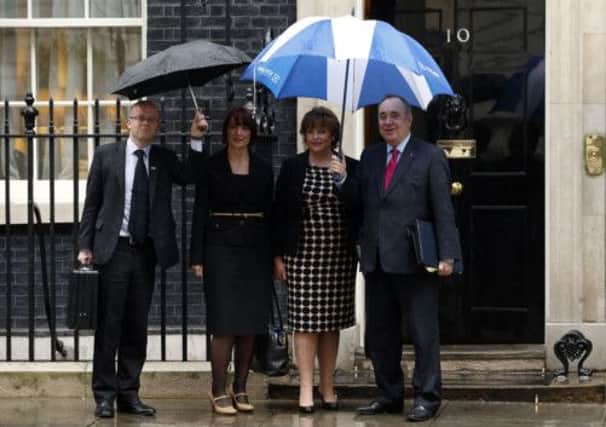 First Minister Alex Salmond, far right, and his delegation arrive at Downing Street. Picture: Getty