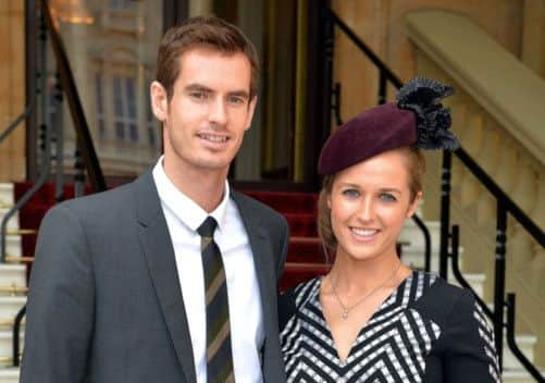 Andy and his girlfriend Kim Sears at Buckingham Palace. Picture: PA