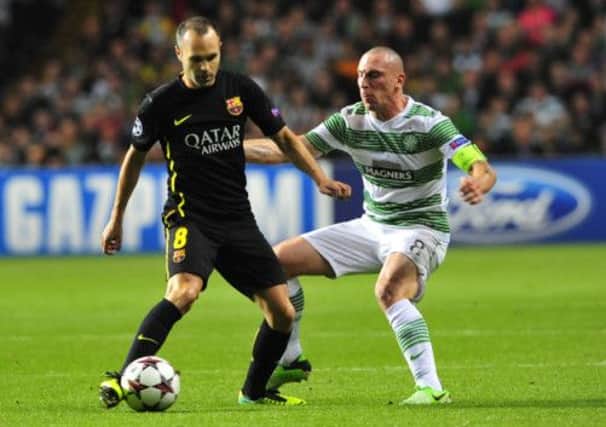 Scott Brown has been handed a three-match Champions League ban after being sent off against Barcelona earlier this month. Picture: Robert Perry