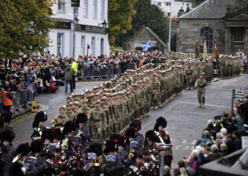 Soldiers from the Royal Highland Fusiliers, 2nd Battallion The Royal Regiment of Scotland march through Penicuik. Picture: Phil Wilkinson