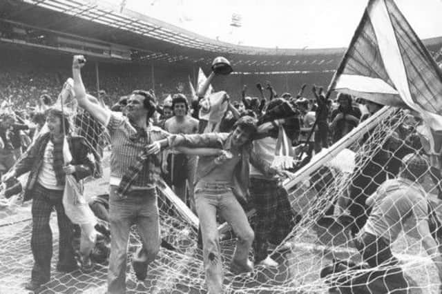 The Tartan Army bring down the goalposts at Wembley after Scotland's 2-1 win over England in 1977. Picture: Denis Straughan