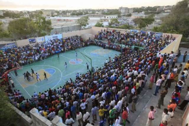 A basketball game in progress at Lujino Stadium, Mogadishu, emblematic of Somali life without the power and presence of al-Shabaab in the streets. Picture: Reuters