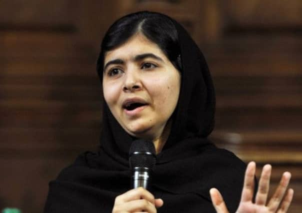 Malala Yousafzai addresses the first Global Citizenship Commission, at the University of Edinburgh. Picture: Getty