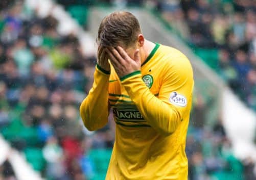 Kris Commons pulls up before going off injured. Picture: PA