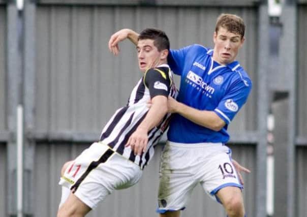 St Mirren's Kenny McLean tussles with David Wotherspoon. Picture: SNS