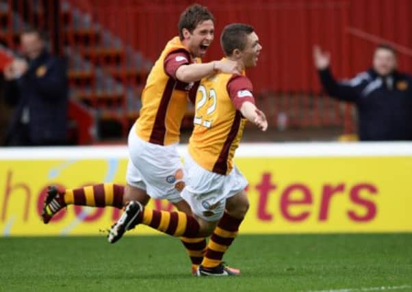 Motherwell's Craig Moore celebrates his opening goal. Picture: SNS