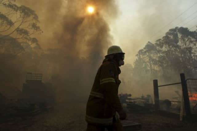 A firefighter tackles the blaze at Clarence, NSW. Picture: Getty