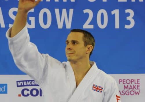 Euan Burton was presented with gold by his wife. Picture: SNS