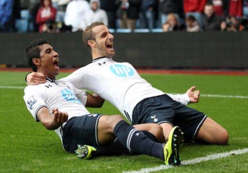Roberto Soldado celebrates scoring his side's second goal with Joe Paulo Paulinho, left, at Villa Park yesterday. Picture: PA