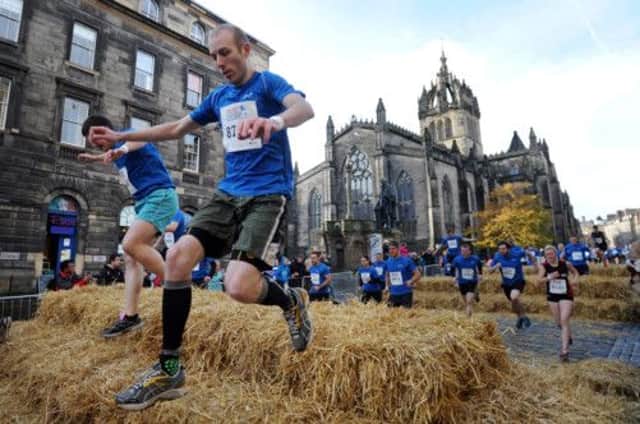 Competitors in the 2013 Edinburgh  'Mens Health Survival of the Fittest' event. Picture: Jane Barlow