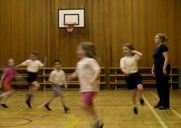 Children who exercise are more likely to do better in academic tests when they're older, new research suggests. Picture: TSPL