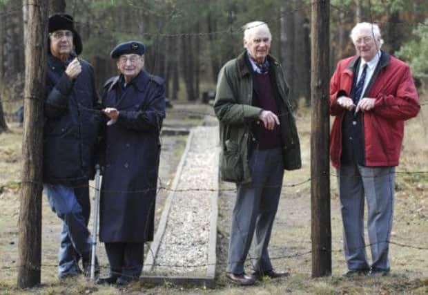 L-R: Andrew Wiseman, Alfie Fripp, Frank Stone and  Regie Cleaver at Stalag Luft III in Poland. Picture: PA