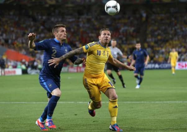 Andriy Voronin holds off Mathieu Debuchy during the EURO 2012 match between Ukraine and France. Picture: Getty