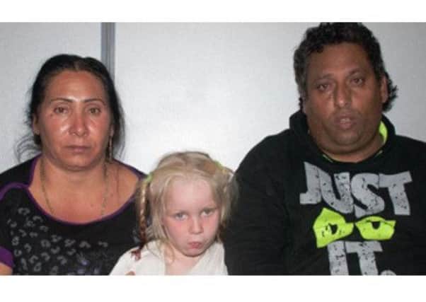 "Maria", with the adults she was living with. Picture: Contributed