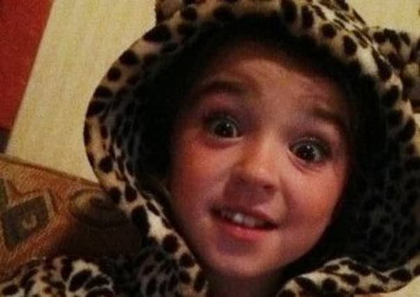 Broagan McCuaig faces a two-month hospital stay as medics try to repair damage done by two American bulldogs. Picture: Facebook