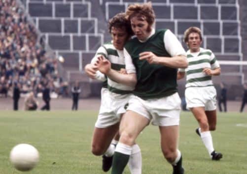 John Blackley, right, goes shoulder to shoulder with Celtics Dixie Deans during his days as a Hibs player as Kenny Dalglish looks on. Picture: SNS