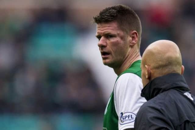 Hibernian defender Michael Nelson left the pitch with a bump on his face. Picture: SNS