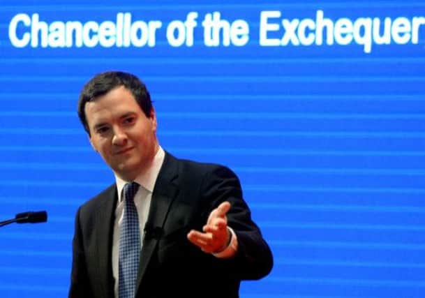 George Osborne has a chance to smile after public borrowing fell sharply last month. Picture: Getty Images