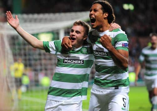 James Forrest and Virgil van Dijk celebrate against Ajaxl. Picture: Ian Rutherford