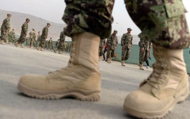 Trainee officers on the parade grounds of the Afghanistan National Army Officers Academy in Kabul. Picture: Getty
