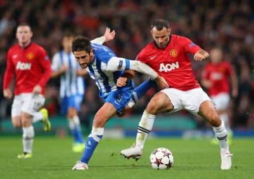 Markel Bergara of Real Sociedad, left, battles with Manchester Uniteds Ryan Giggs. Picture: Getty