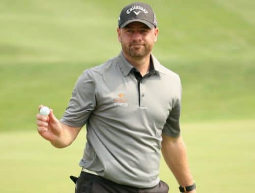 Scotland's Craig Lee of Scotland waves to the crowd on the 18th hole at Lake Malaren in Shanghai. Picture: Getty Images
