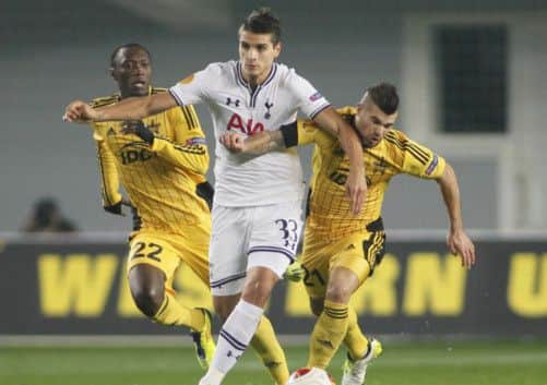 Sheriff Tiraspol's Djibril Paye and Skobi Moyal fight for the ball with Tottenham's Erik Lamela. Picture: Reuters