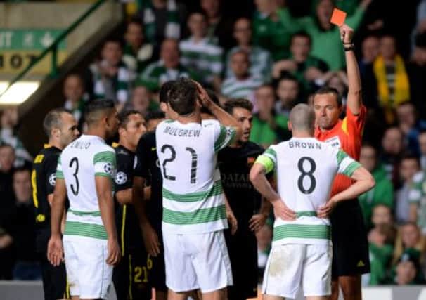Scott Brown was shown a red card against Barcelona last month. Picture: SNS