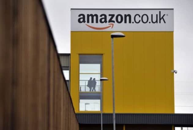 Amazon chief executive Jeff Bezos said it had been a 'busy few months' for the group. Picture: Phil Wilkinson