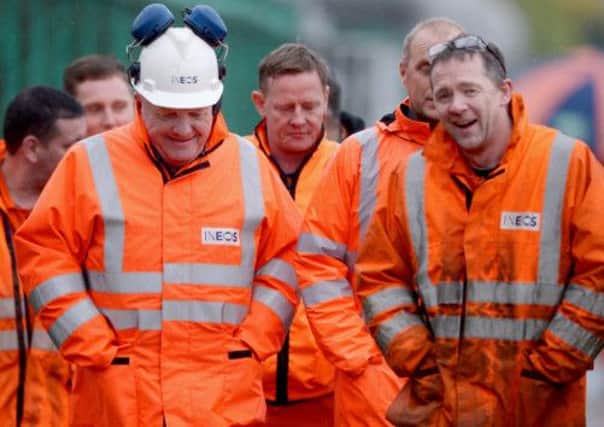 Employees at the Grangemouth petrochemical plant react to the news that it is to stay open. Picture: Getty