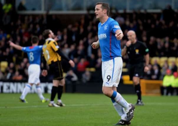 Jon Daly celebrates on his way to grabbing a hat-trick. Picture: SNS