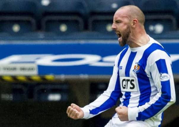 Kris Boyd roars with delight after putting Kilmarnock a goal ahead. Picture: SNS