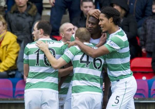 Amido Balde (2nd from right) celebrates his goal with his team-mates. Picture: SNS